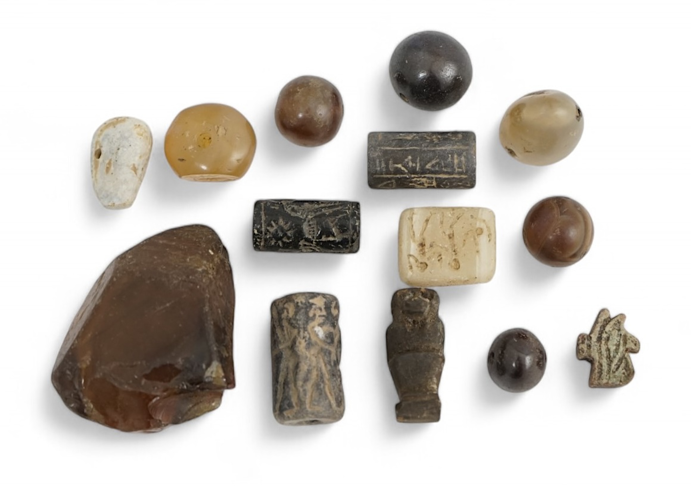 A collection of Ancient Egyptian beads, seals, etc., Acquired 1990s